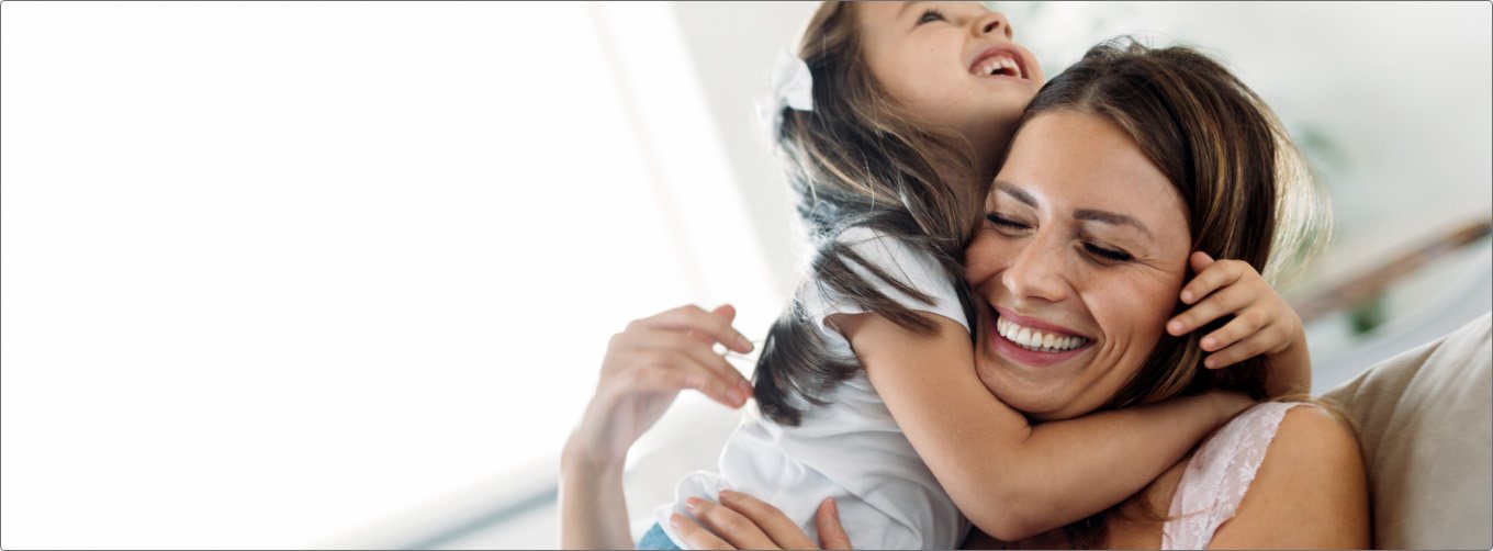 mother smiling with her daughter